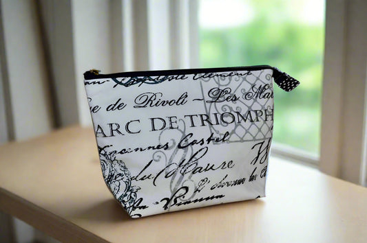 The Vogue Cosmetic Bag – Black & White French Script with Blue Lining