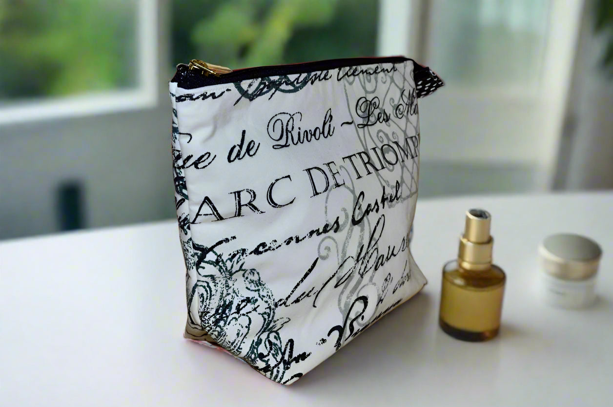 The Vogue Cosmetic Bag – Black & White French Script with Blue Lining