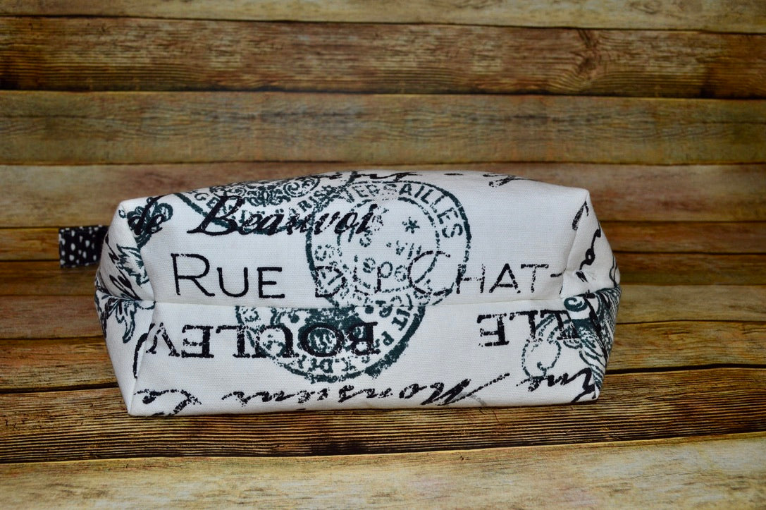 The Vogue Cosmetic Bag – Black & White French Script with Blue Lining